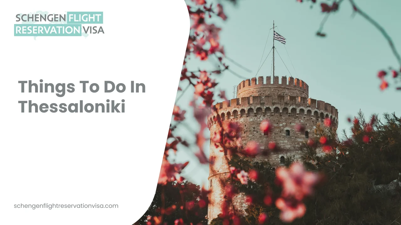White Tower of Thessaloniki framed by blooming flowers, symbolizing top things to do in Thessaloniki, Greece, with city travel and sightseeing theme.