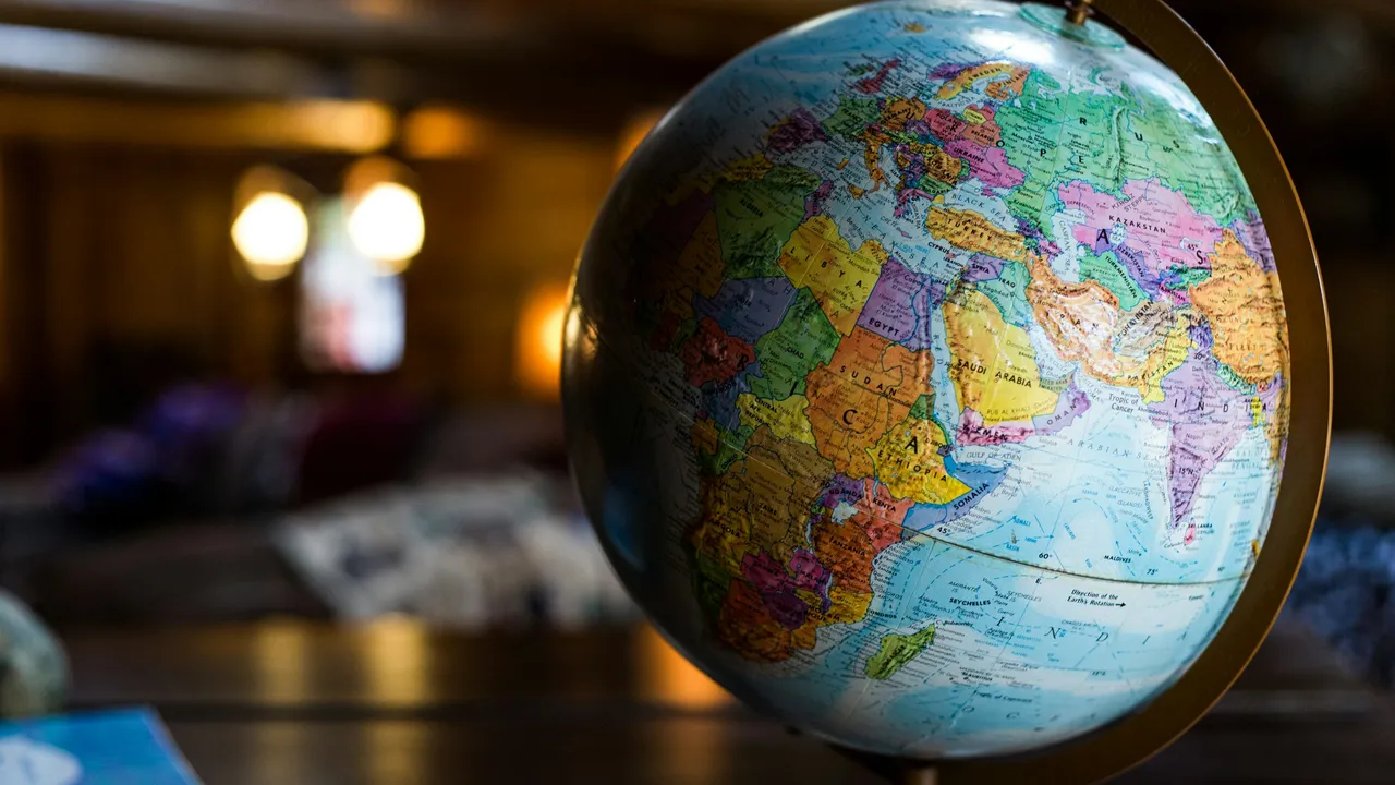 World globe highlighting Europe, Africa, and the Middle East, representing countries that offer e-visa facilities to Pakistani citizens for international travel.