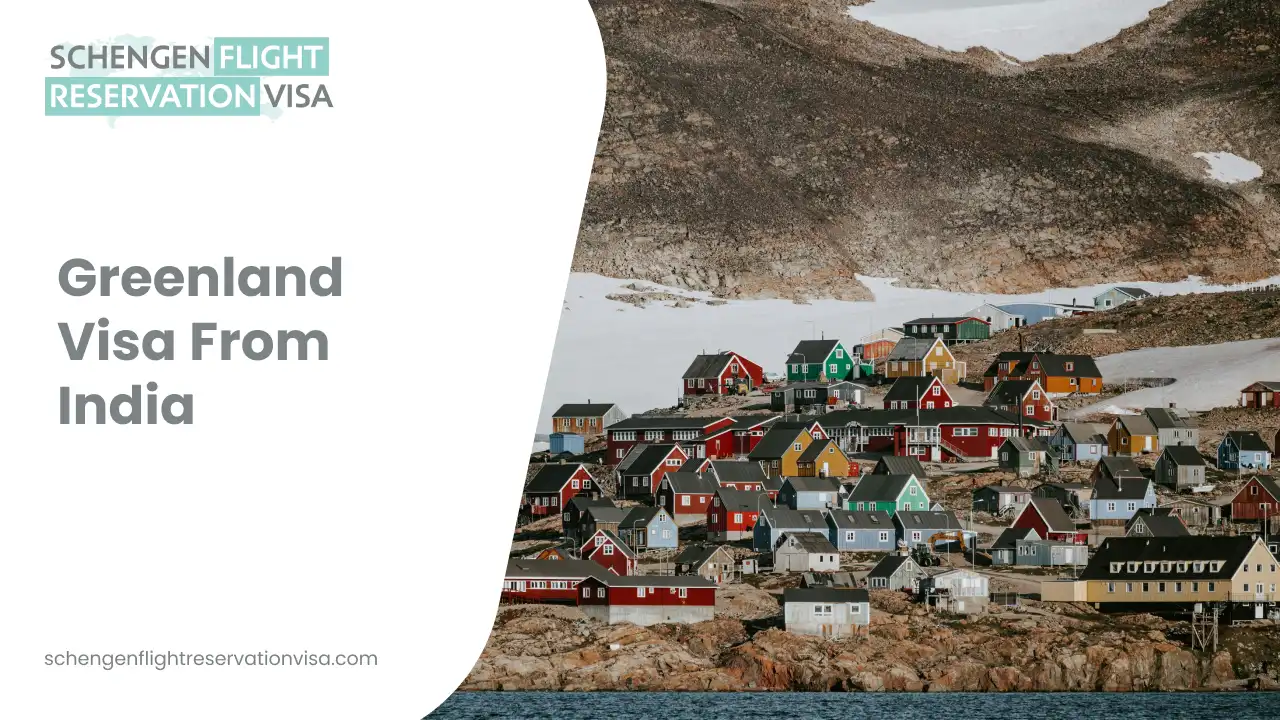 A panoramic view of a coastal village in Greenland, featuring a cluster of colorful red, blue, green, and yellow houses nestled against a rugged, snow-dusted rocky hillside. In the foreground, the dark blue water of the coast is visible. On the left, a white graphic overlay displays the