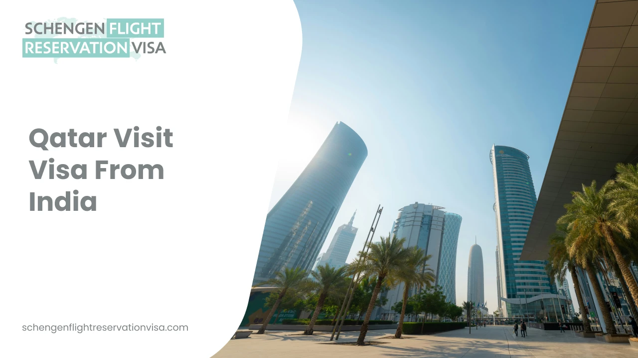 An wide-angle, low-angle view of the modern Doha skyline in Qatar under a bright, clear sky. The image features several distinctively designed skyscrapers, palm trees lining a paved walkway in the foreground, and a large building overhang on the right side of the frame.