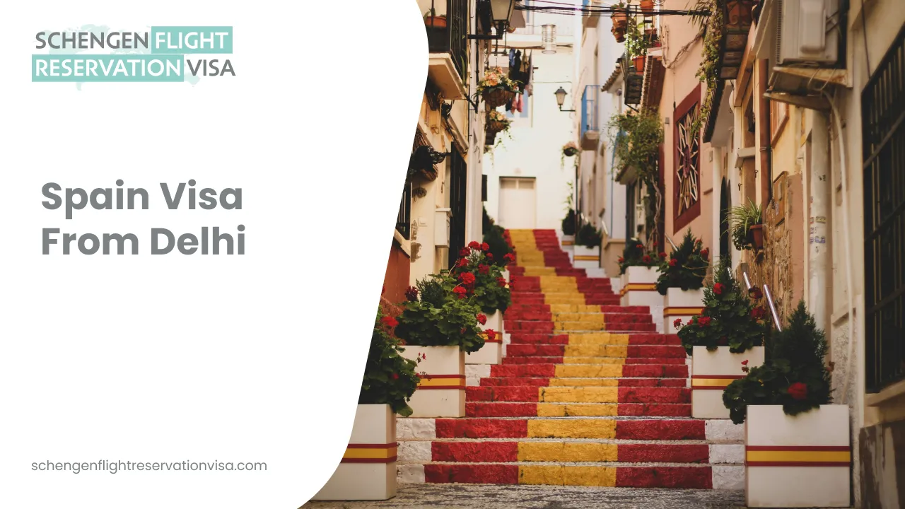 Spain visa from Delhi promotional banner showing a colorful Spanish street staircase in red and yellow, representing Schengen flight reservation and visa services.